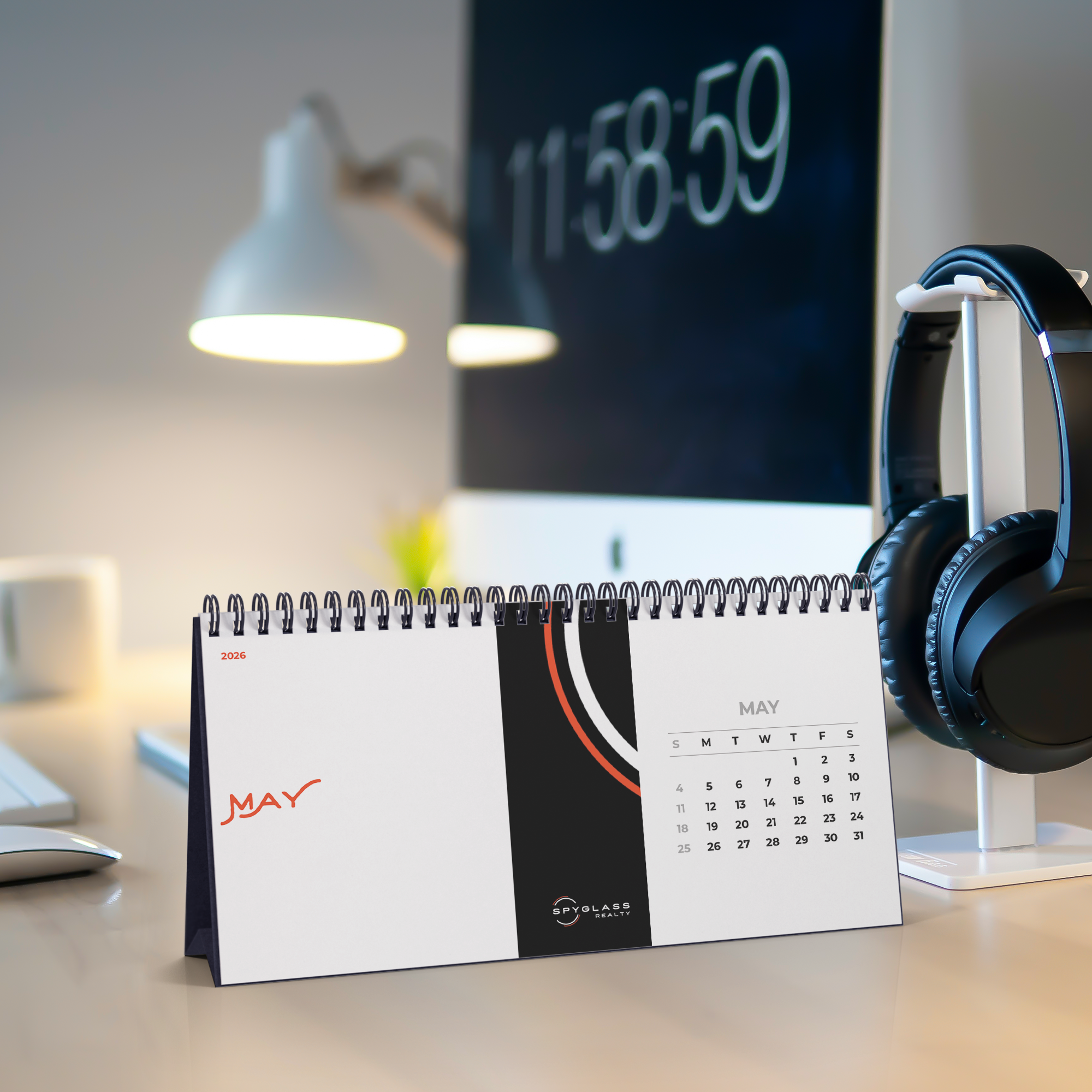 2026_Spyglass_Realty_Desk_Calendar_Computer_Mockup.png