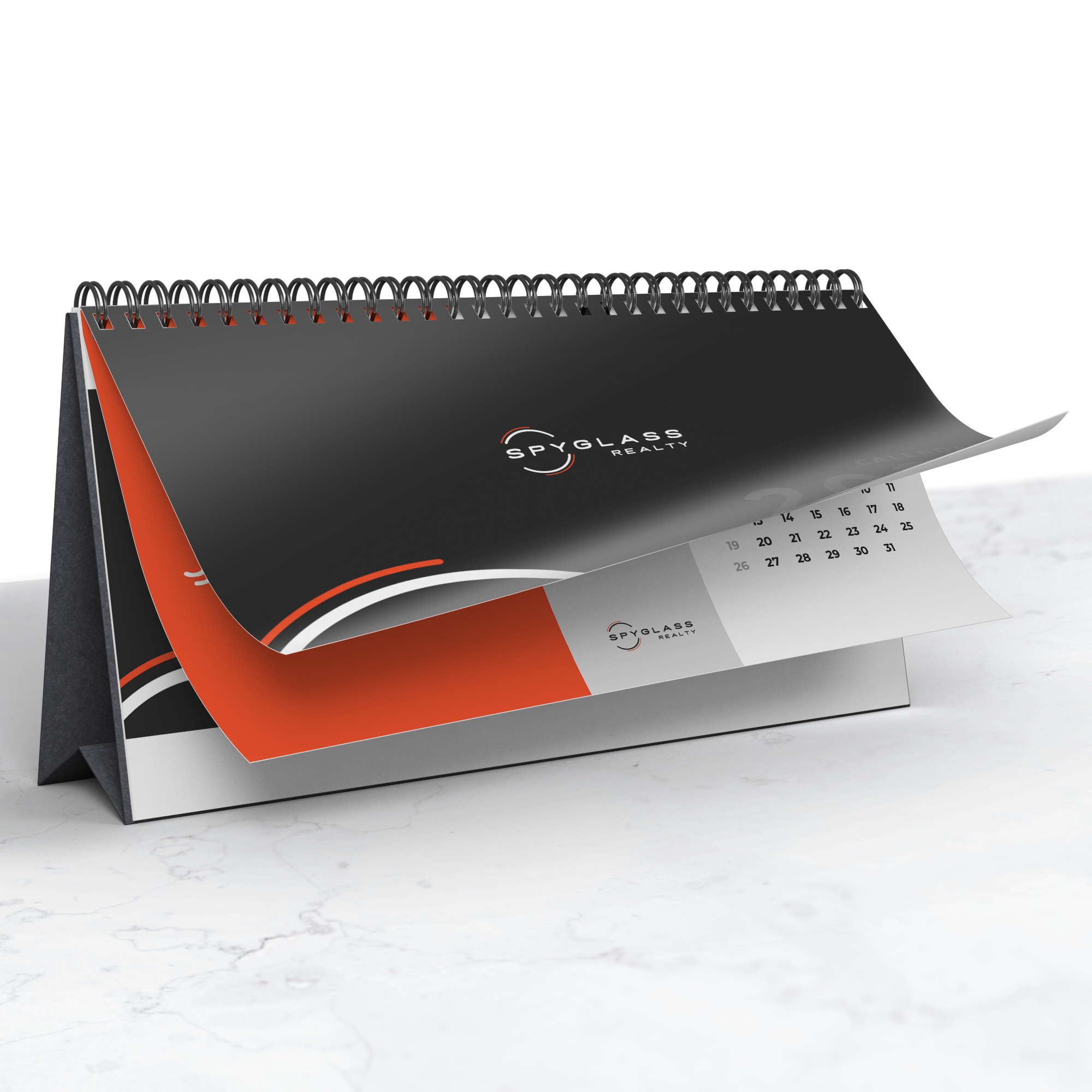 2026_Spyglass_Realty_Desk_Calendar_Folded_Pages_Mockup.png