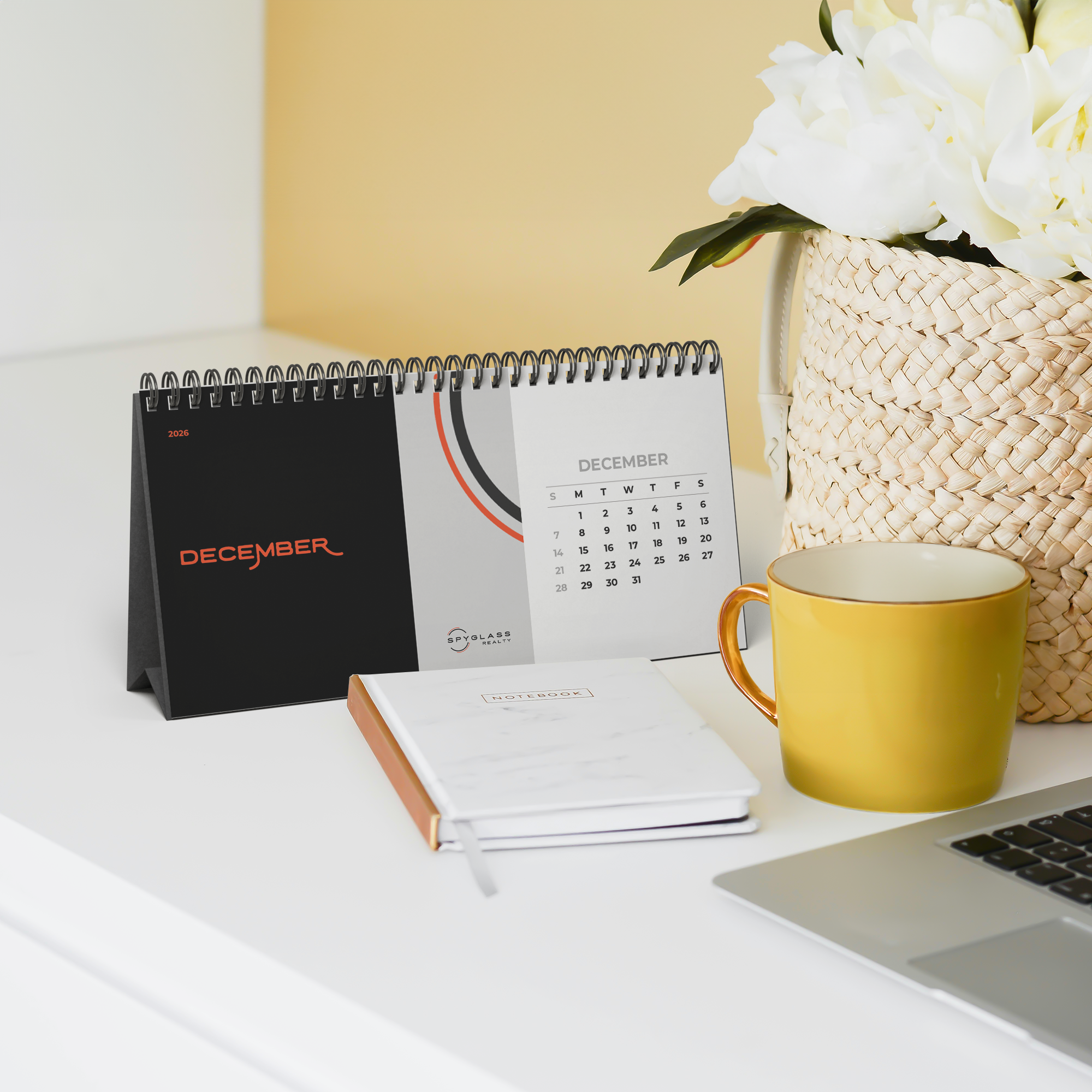 2026_Spyglass_Realty_Desk_Calendar_Yellow_Mug_Mockup.png